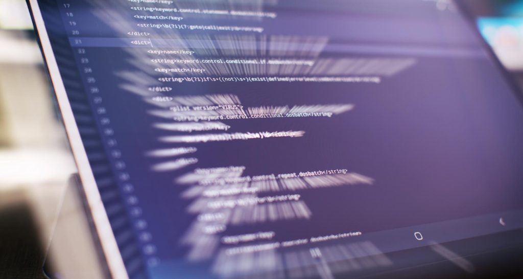 Source code with XML/HTML markup representing Plausible custom event tracking script